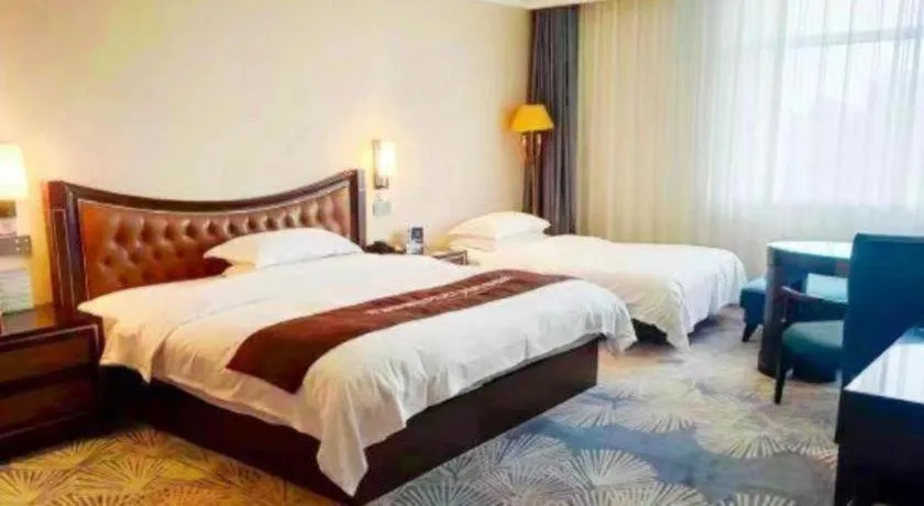 Bed in Qingdao Danube International Hotel