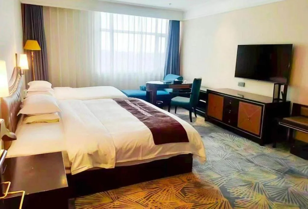 Bed in Qingdao Danube International Hotel