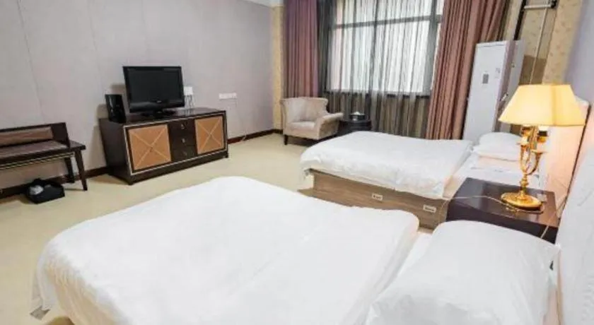 Bed in Qingdao Danube International Hotel