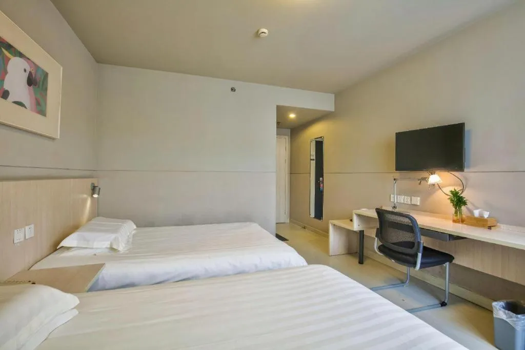 Bed in Jinjiang Inn Taizhou Huangyan Jiufeng Park