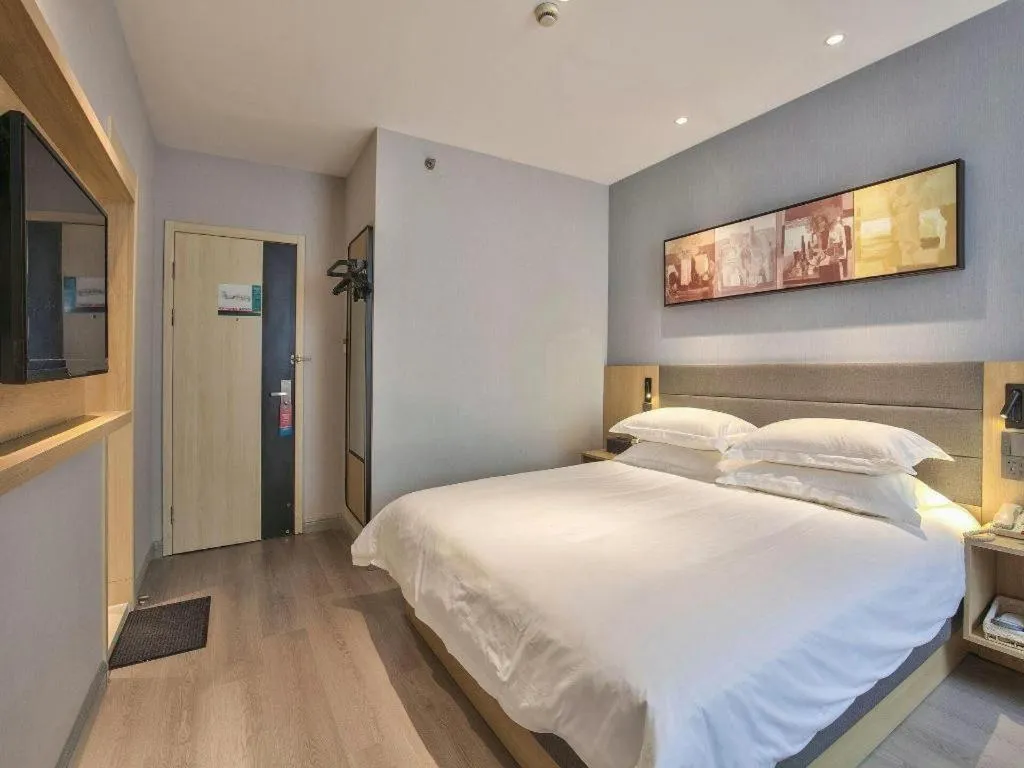 Bed in Jinjiang Inn Taizhou Huangyan Jiufeng Park