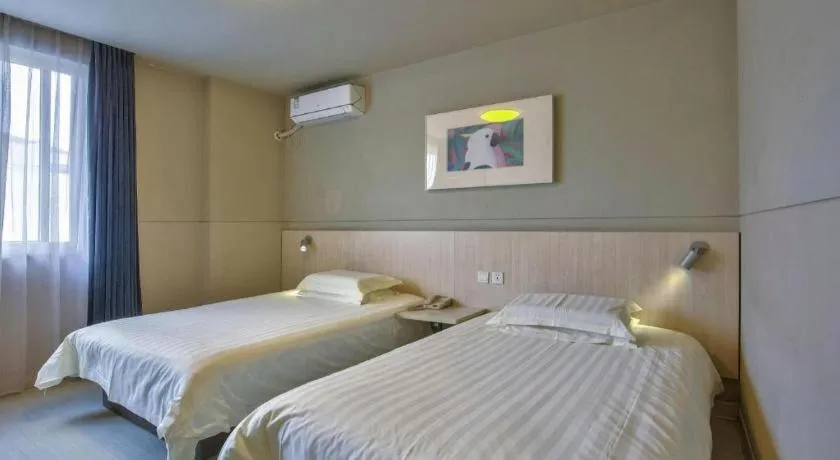 Bed in Jinjiang Inn Taizhou Huangyan Jiufeng Park