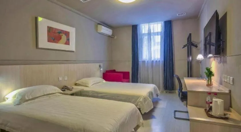 Bed in Jinjiang Inn Taizhou Huangyan Jiufeng Park