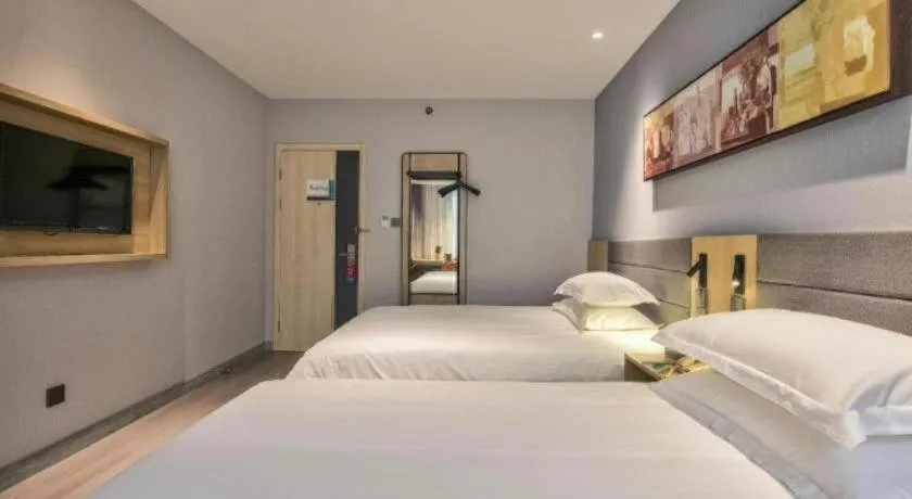 Bed in Jinjiang Inn Taizhou Huangyan Jiufeng Park