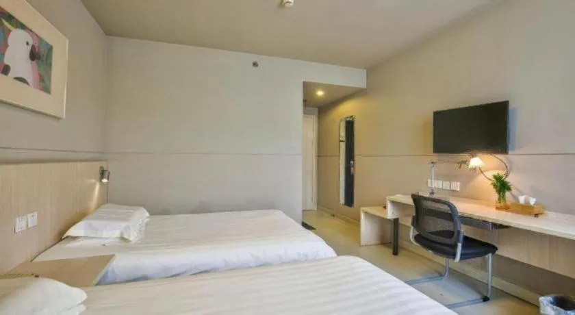 Bed in Jinjiang Inn Taizhou Huangyan Jiufeng Park