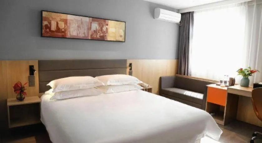 Bed in Jinjiang Inn Taizhou Huangyan Jiufeng Park