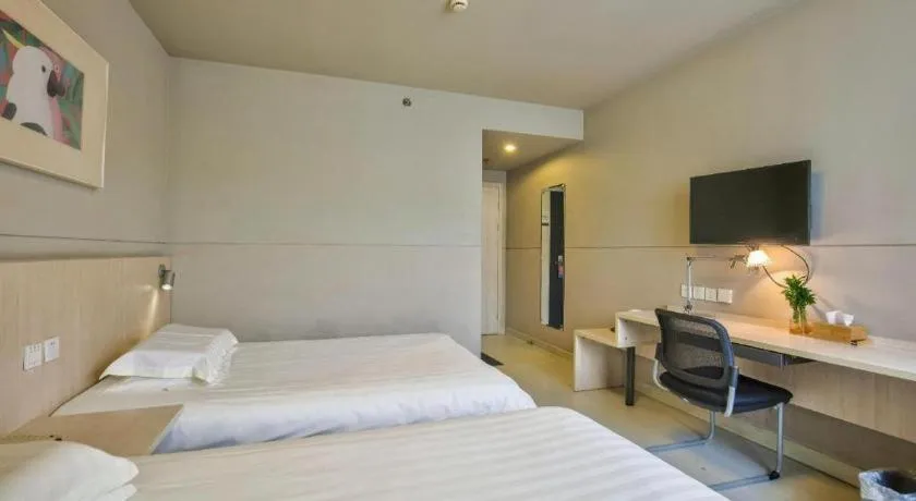 Bed in Jinjiang Inn Taizhou Huangyan Jiufeng Park