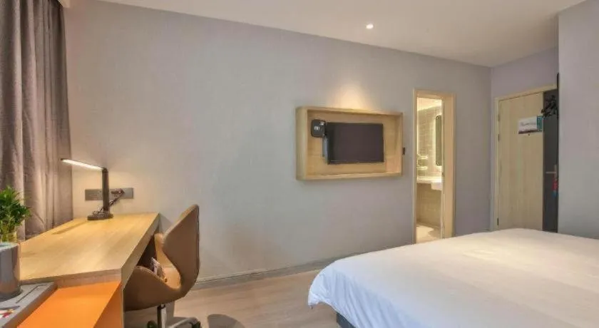 Bed in Jinjiang Inn Taizhou Huangyan Jiufeng Park