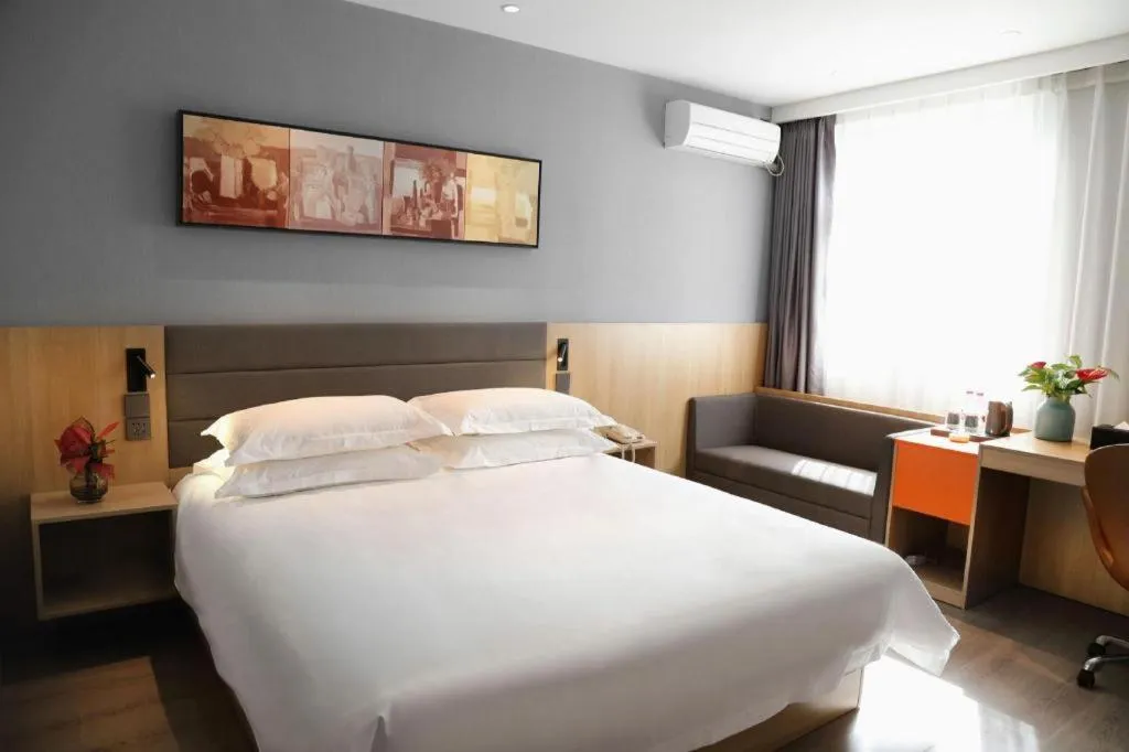 Bed in Jinjiang Inn Taizhou Huangyan Jiufeng Park