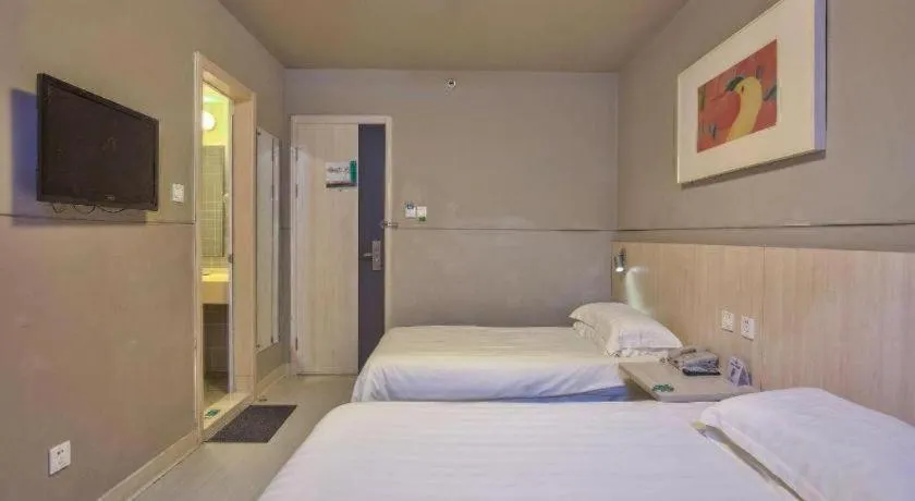 Bed in Jinjiang Inn Taizhou Huangyan Jiufeng Park