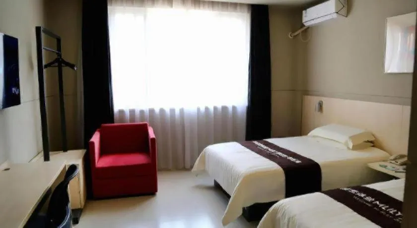 Bed in Jinjiang Inn Taizhou Huangyan Jiufeng Park