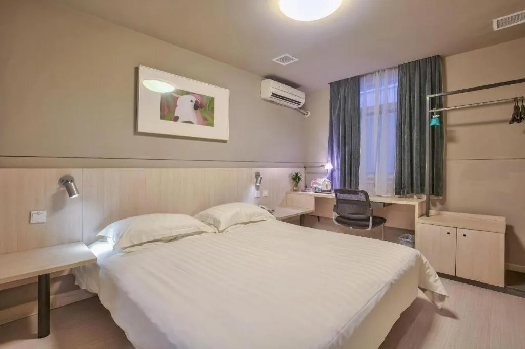 Bed in Jinjiang Inn Taizhou Huangyan Jiufeng Park