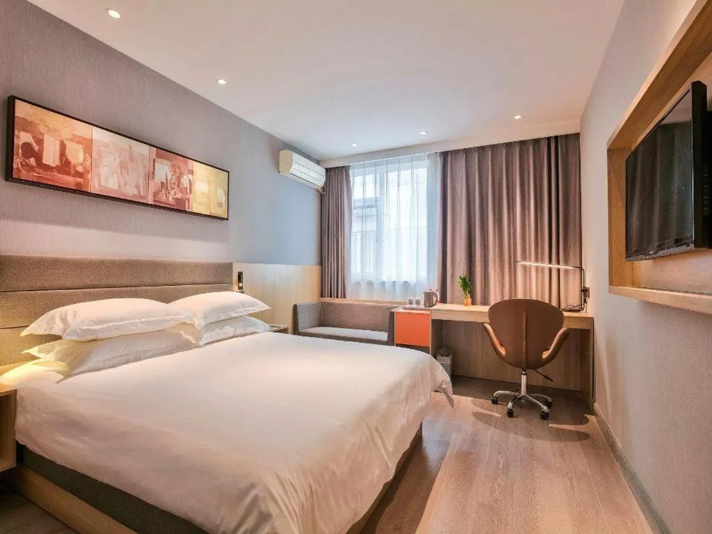 Bed in Jinjiang Inn Taizhou Huangyan Jiufeng Park