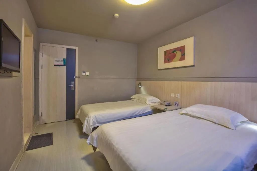 Bed in Jinjiang Inn Taizhou Huangyan Jiufeng Park