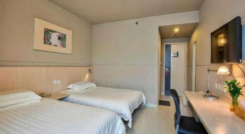 Bed in Jinjiang Inn Taizhou Huangyan Jiufeng Park