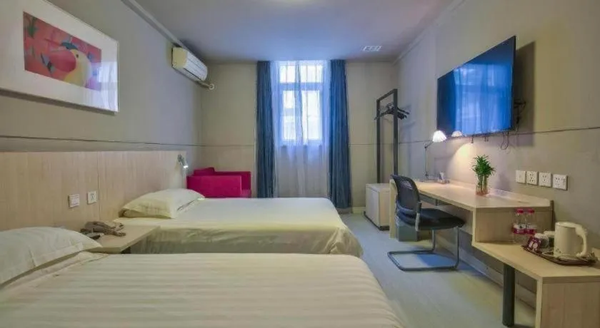 Bed in Jinjiang Inn Taizhou Huangyan Jiufeng Park