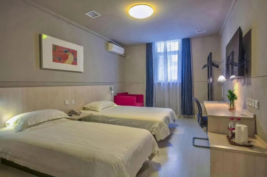 Bed in Jinjiang Inn Taizhou Huangyan Jiufeng Park