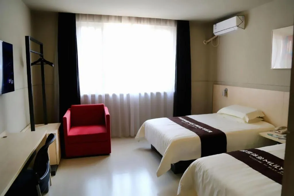 Bed in Jinjiang Inn Taizhou Huangyan Jiufeng Park