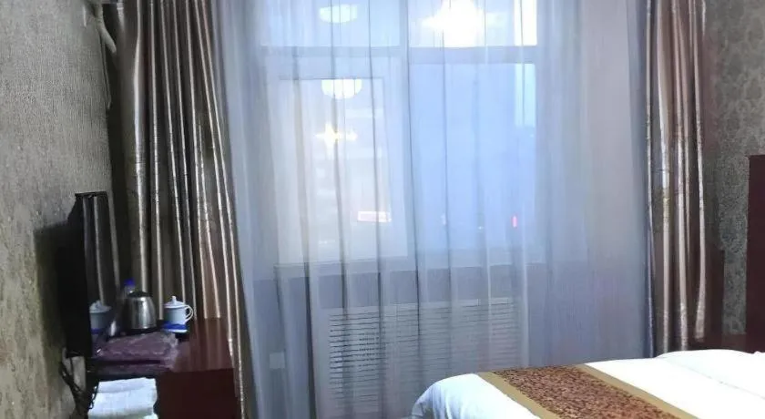 Bed in Shell Hotel Taiyuan South Railway Station New Southeast Bus Station