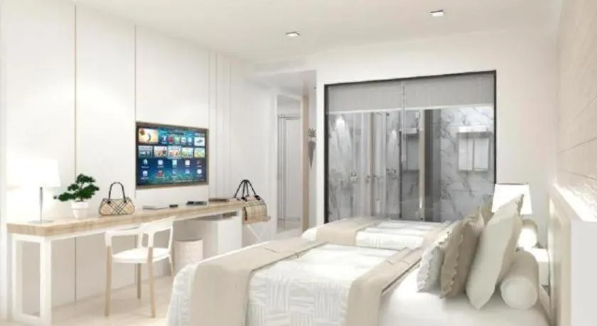 Bed in Thaisun Bangkok Hotel