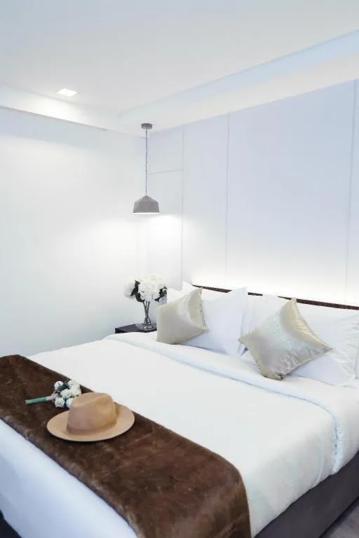 Bed in Thaisun Bangkok Hotel