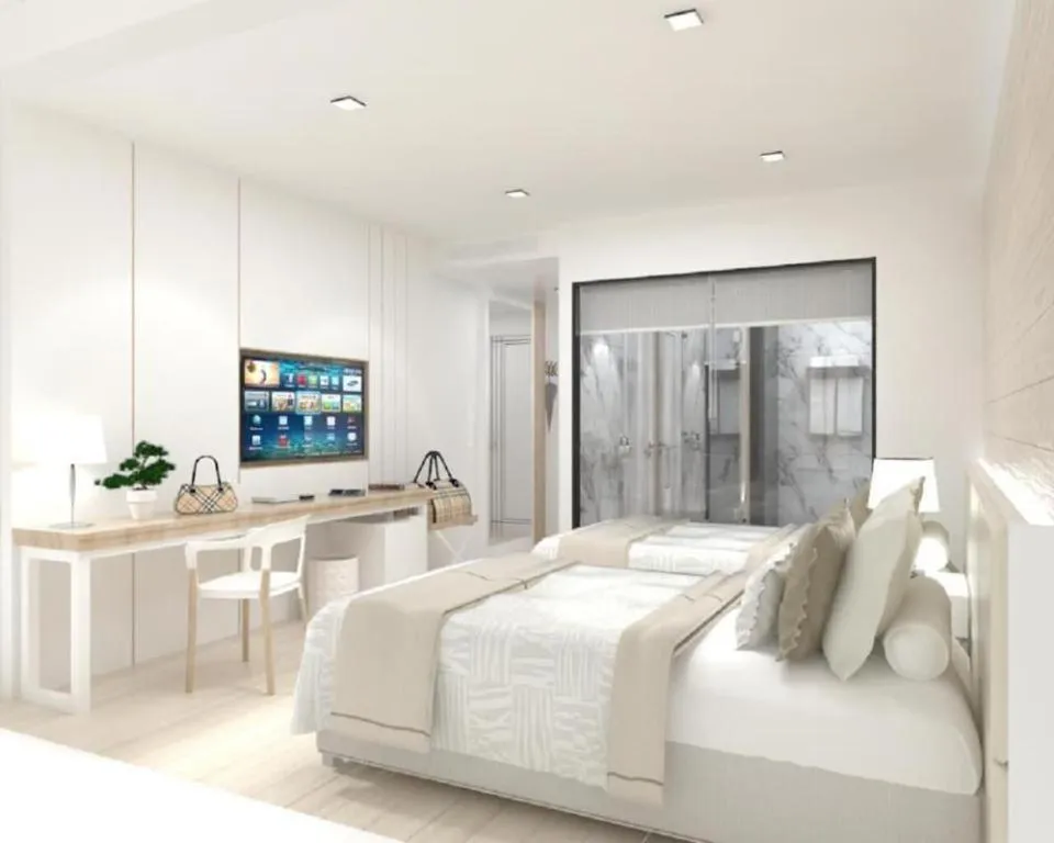 Bed in Thaisun Bangkok Hotel