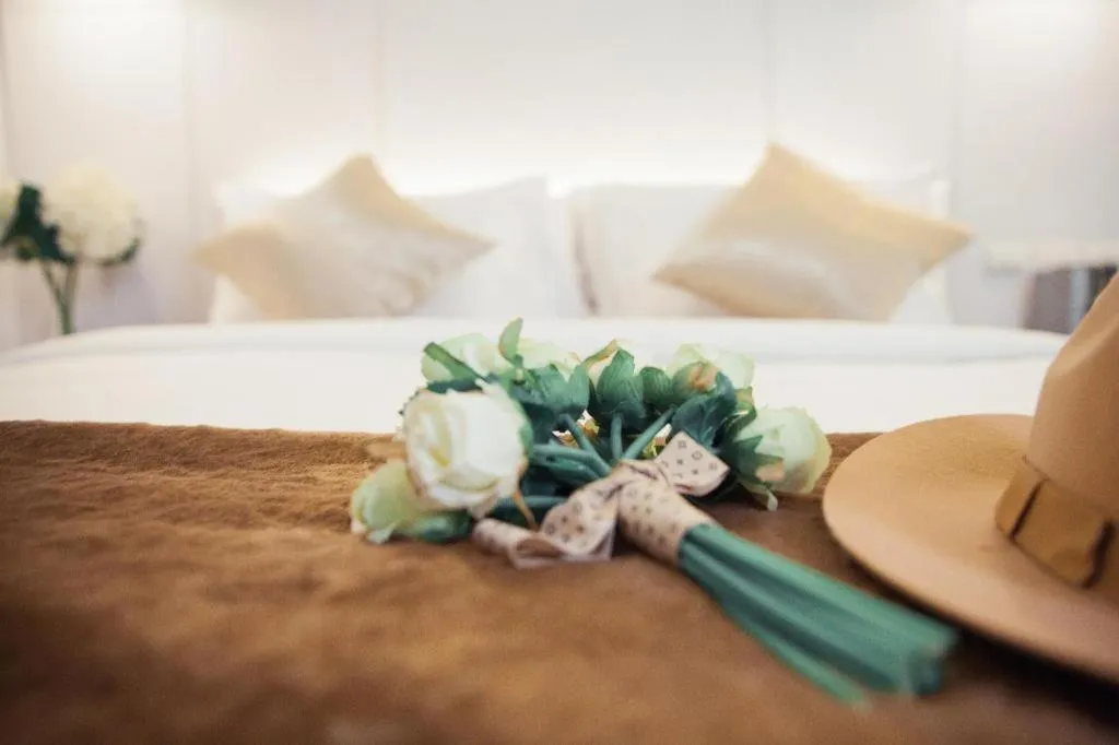 Bed in Thaisun Bangkok Hotel