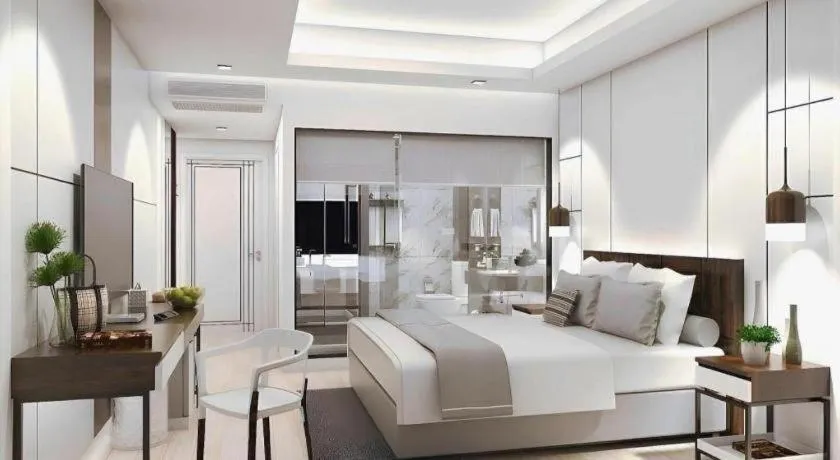 Bed in Thaisun Bangkok Hotel