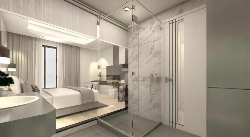 Bed in Thaisun Bangkok Hotel