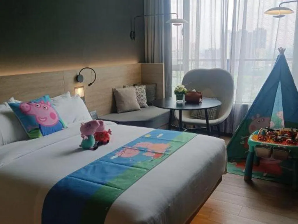 Bed in Opus Hotel Jiangmen