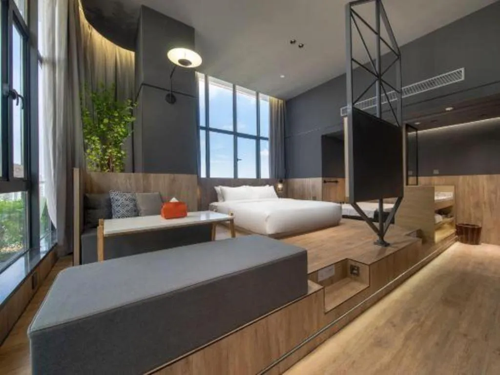 Bed in Opus Hotel Jiangmen