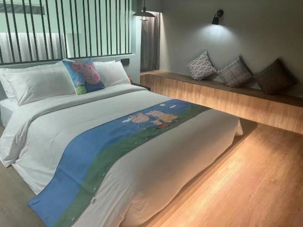 Bed in Opus Hotel Jiangmen