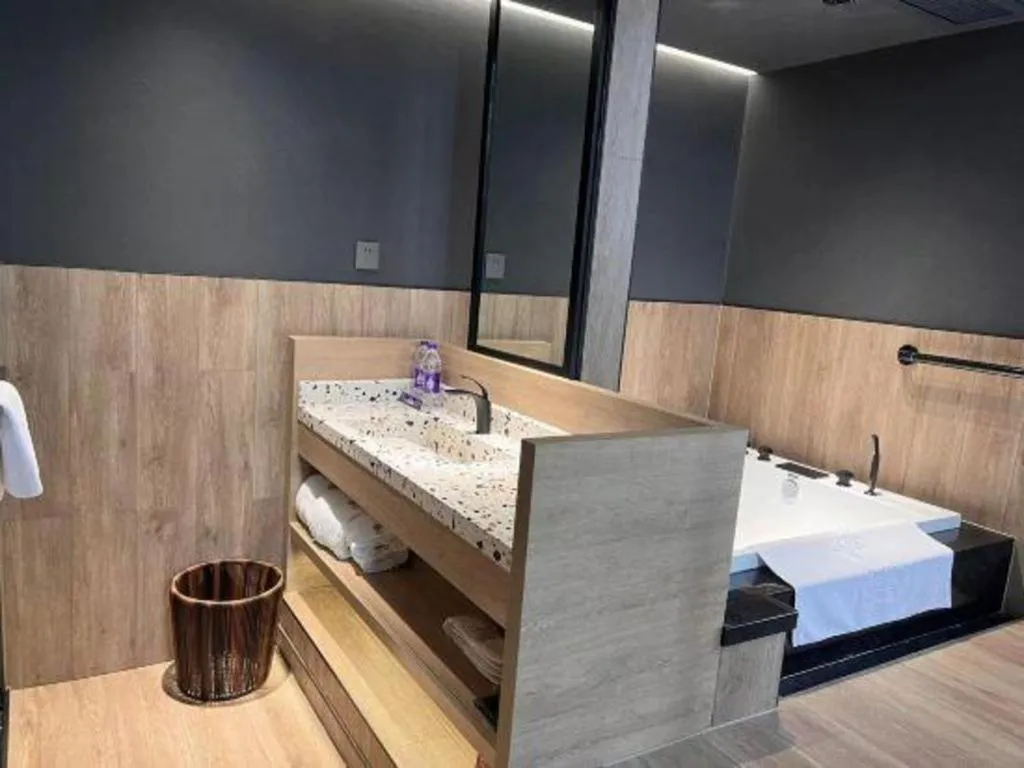 Bed in Opus Hotel Jiangmen