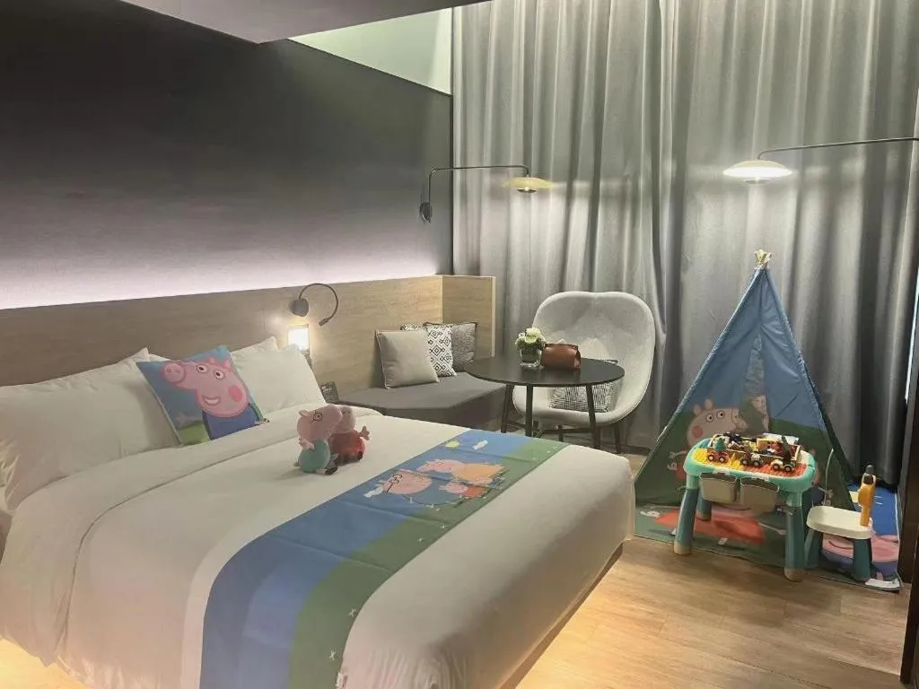 Bed in Opus Hotel Jiangmen