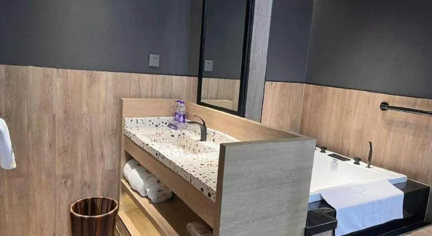 Bed in Opus Hotel Jiangmen