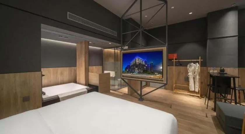 Bed in Opus Hotel Jiangmen