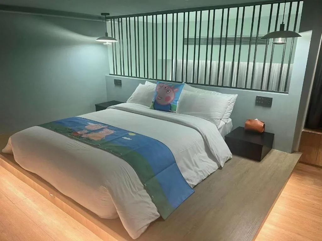 Bed in Opus Hotel Jiangmen