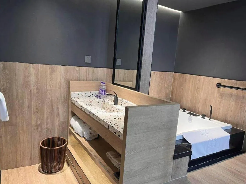 Bed in Opus Hotel Jiangmen