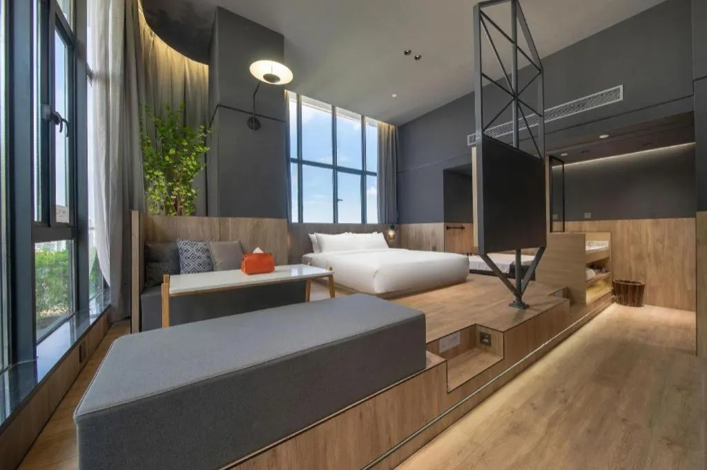 Bed in Opus Hotel Jiangmen