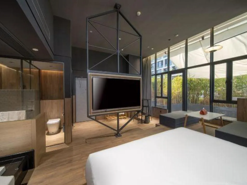 Bed in Opus Hotel Jiangmen