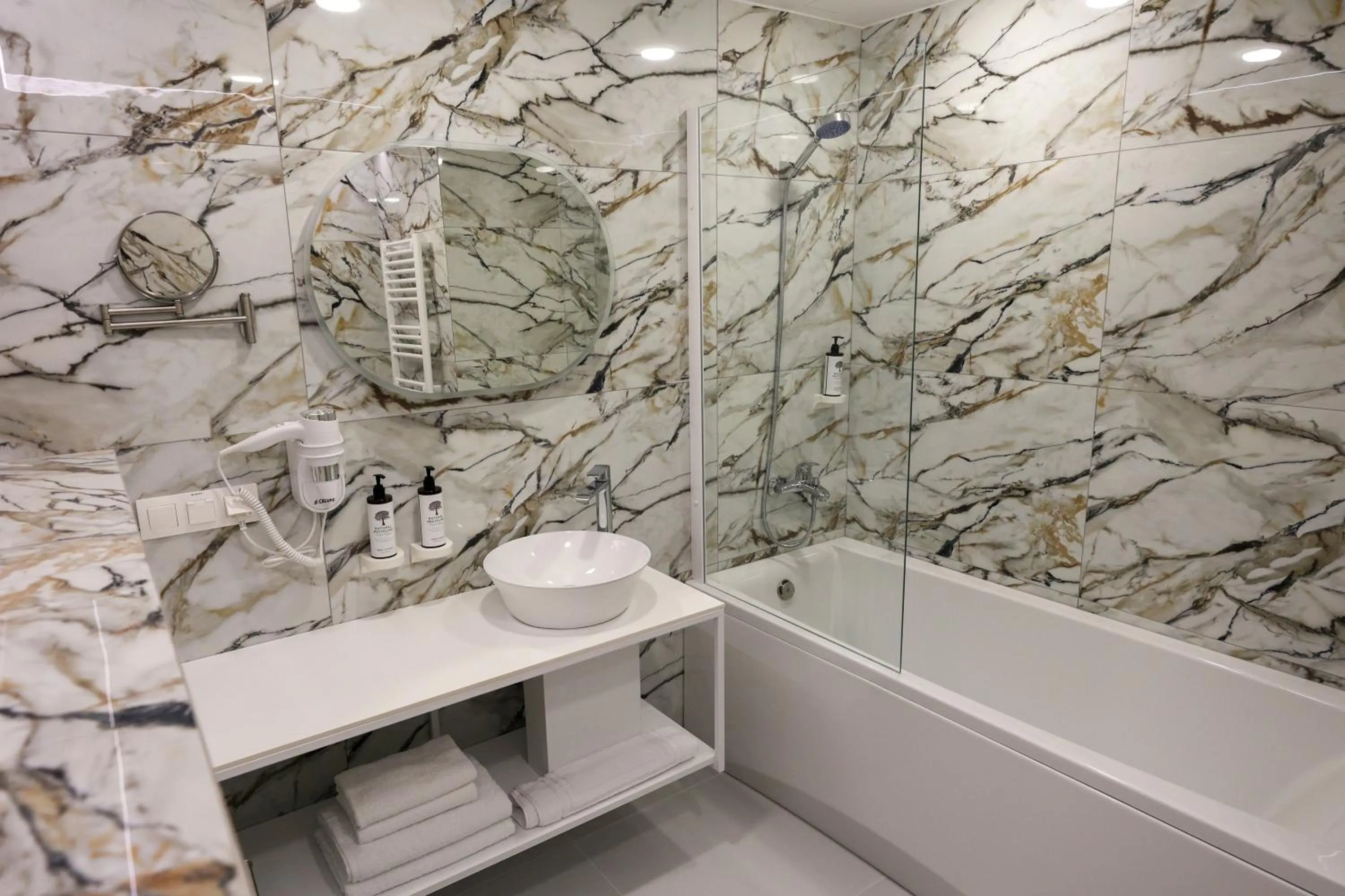 Bathroom in Suncity Hotel & SPA