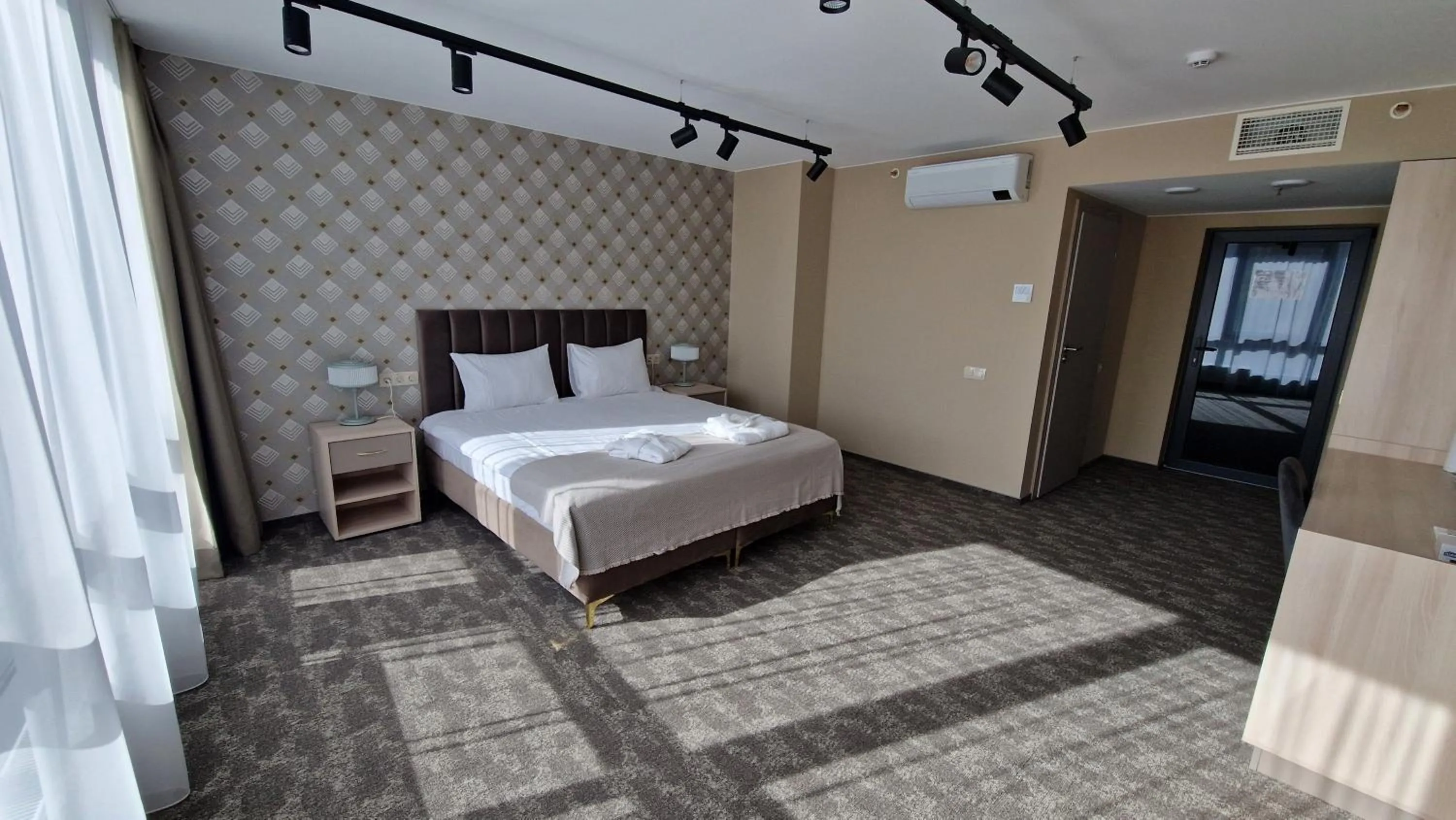 Photo of the whole room, Bed in Suncity Hotel & SPA