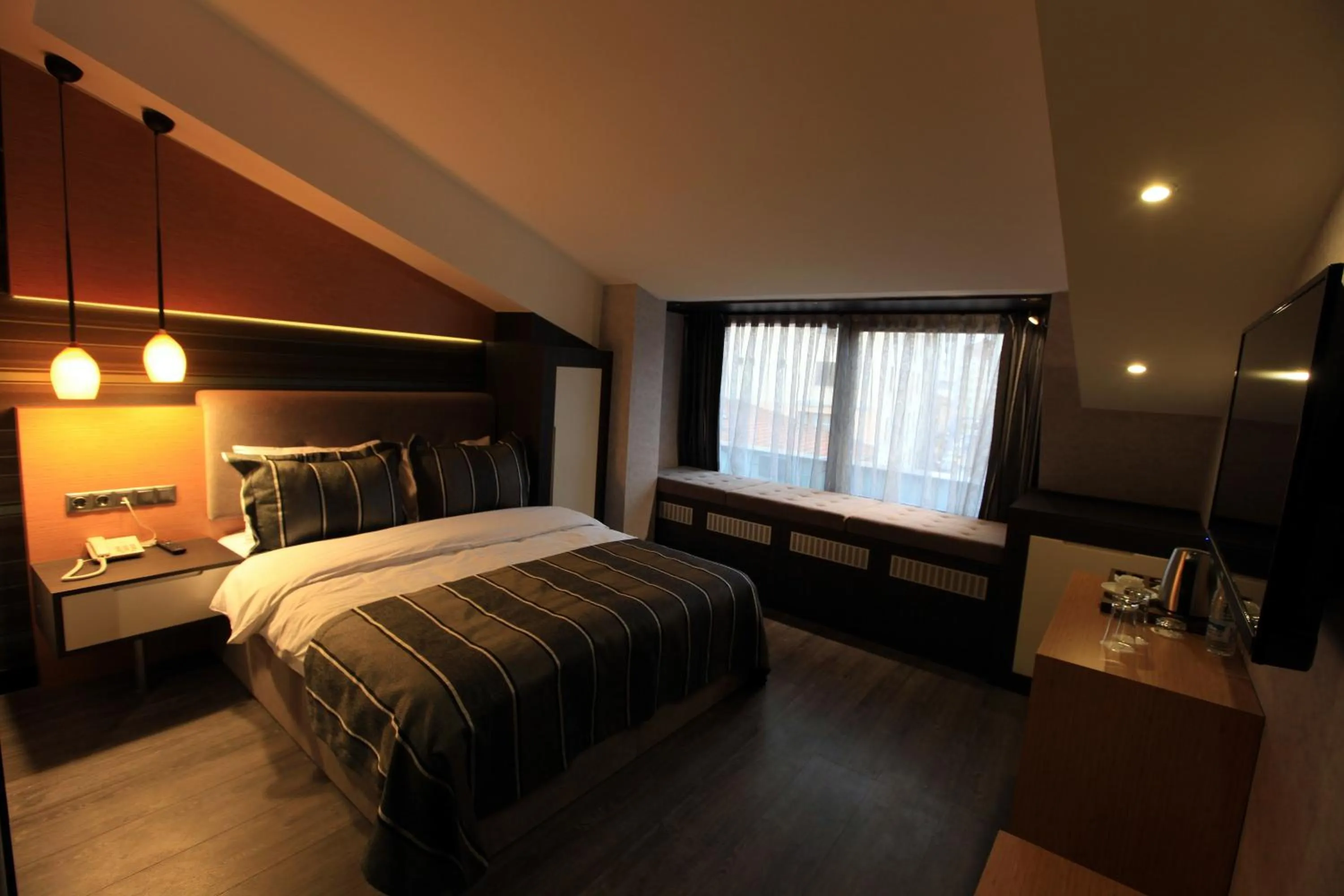 Photo of the whole room, Bed in The Black Hotel
