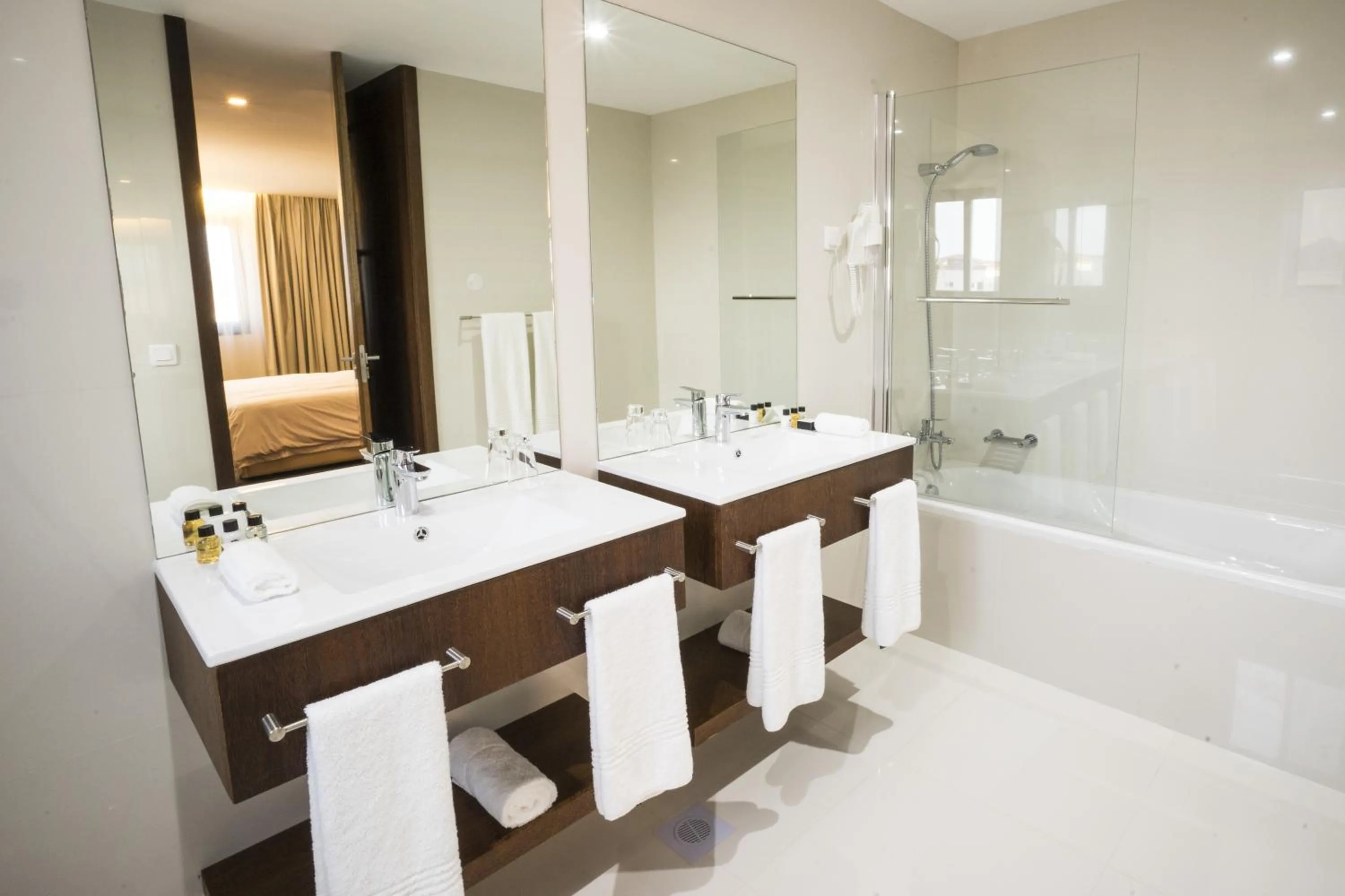 Shower in Fiesta Residences Boutique Hotel and Serviced Apartments.