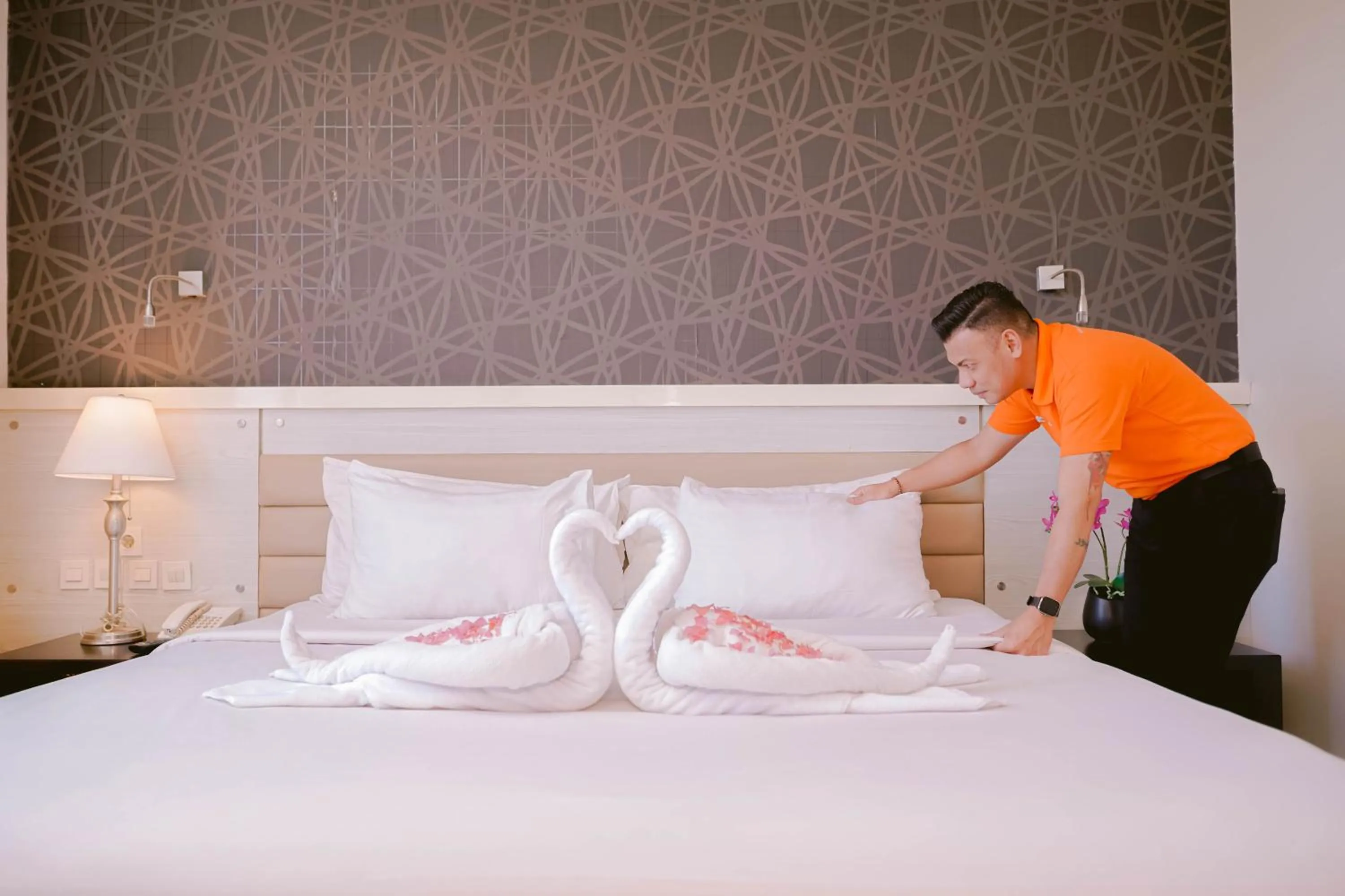 Bed in Sahid T-More Hotel