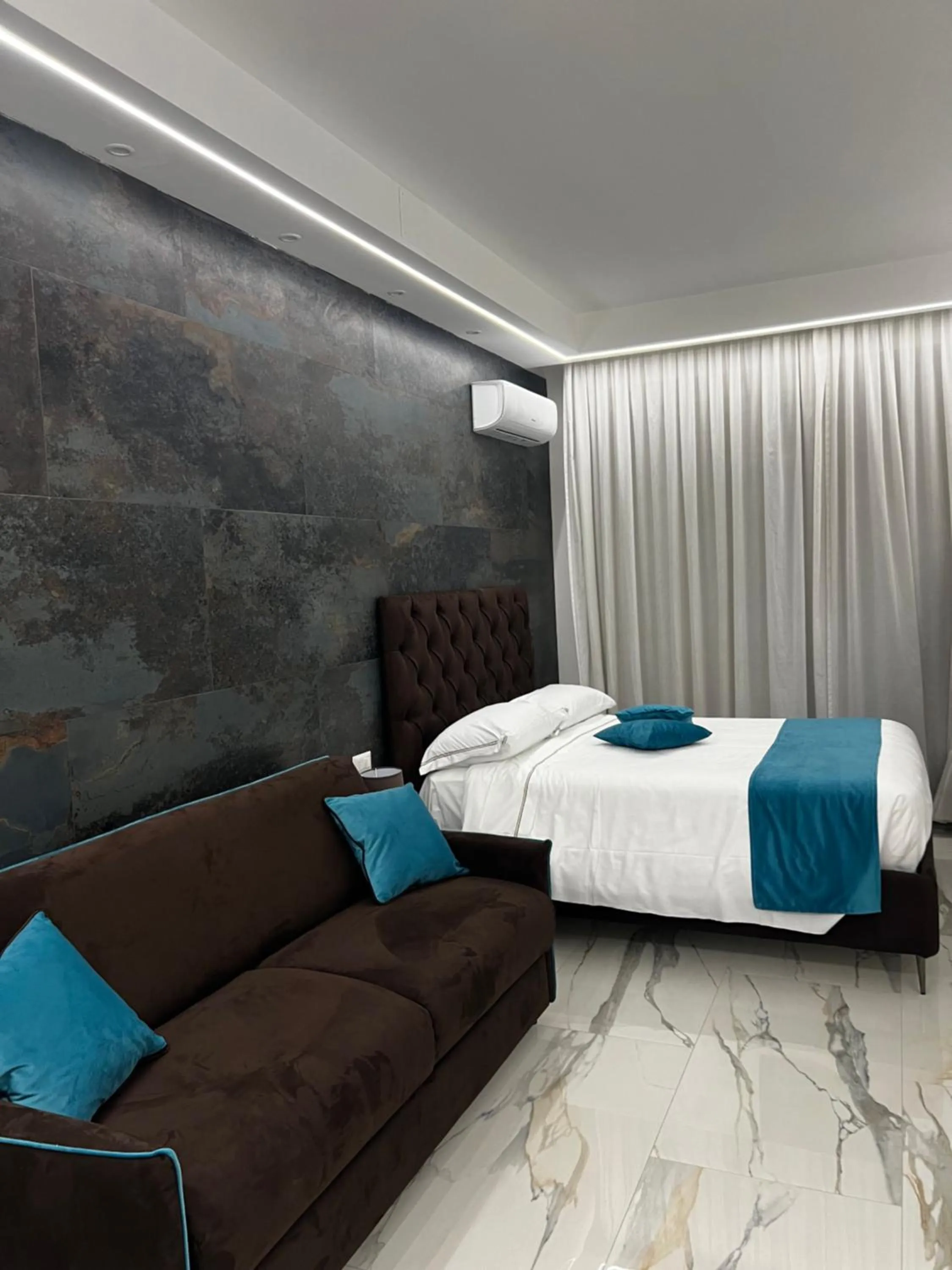 Bed in Parco Tirreno Hotel