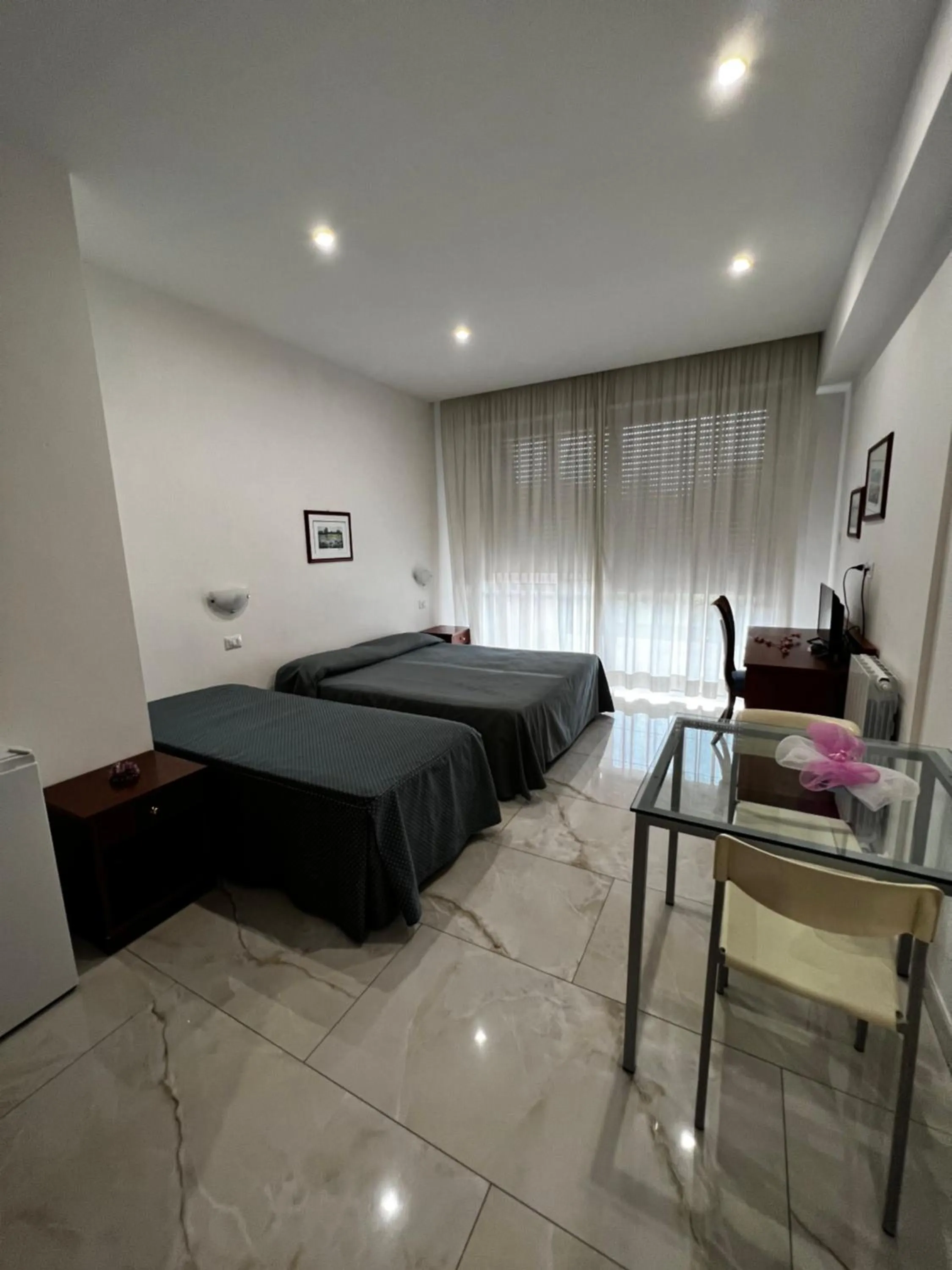 Bed in Parco Tirreno Hotel