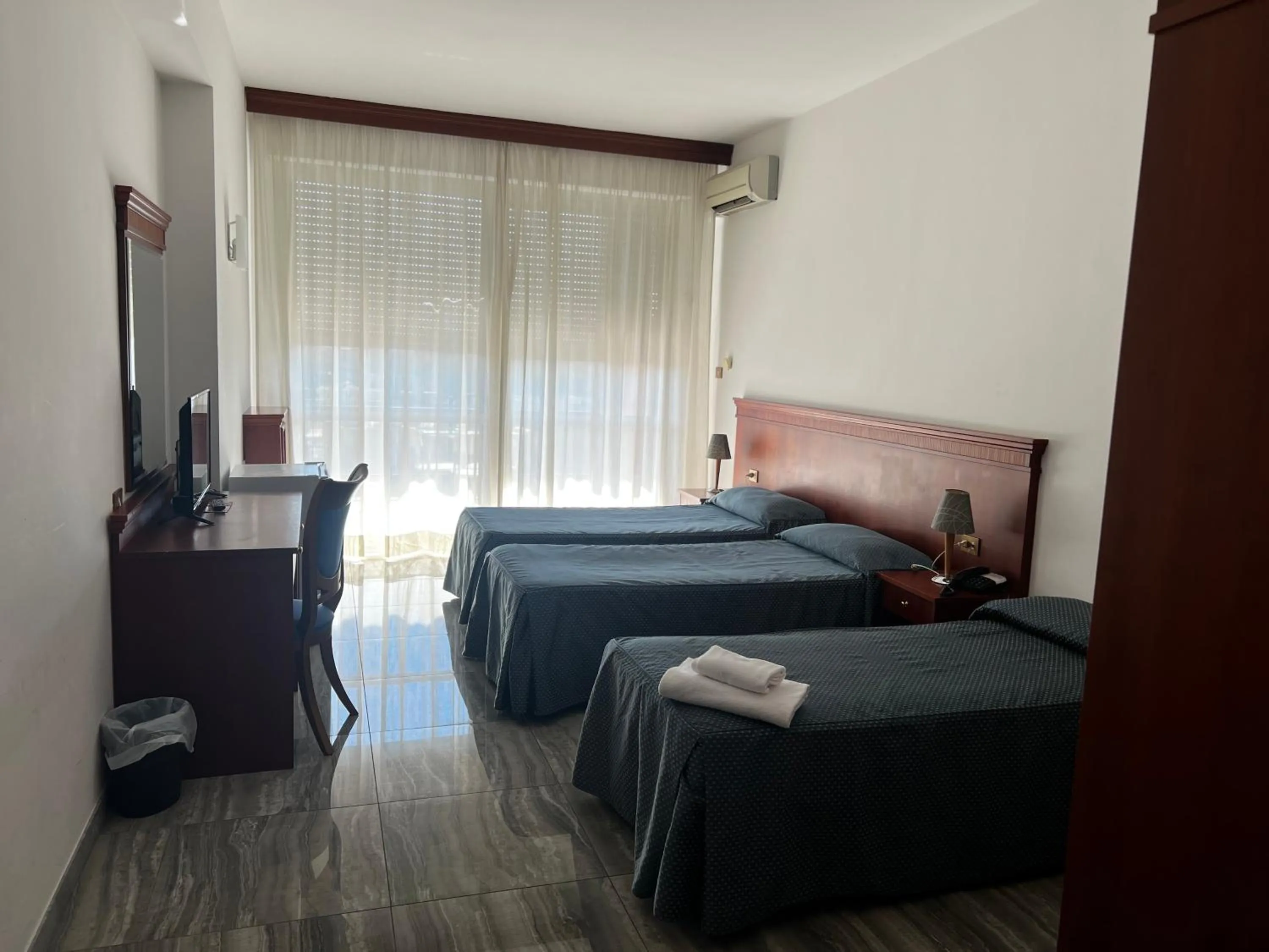 Bedroom in Parco Tirreno Hotel