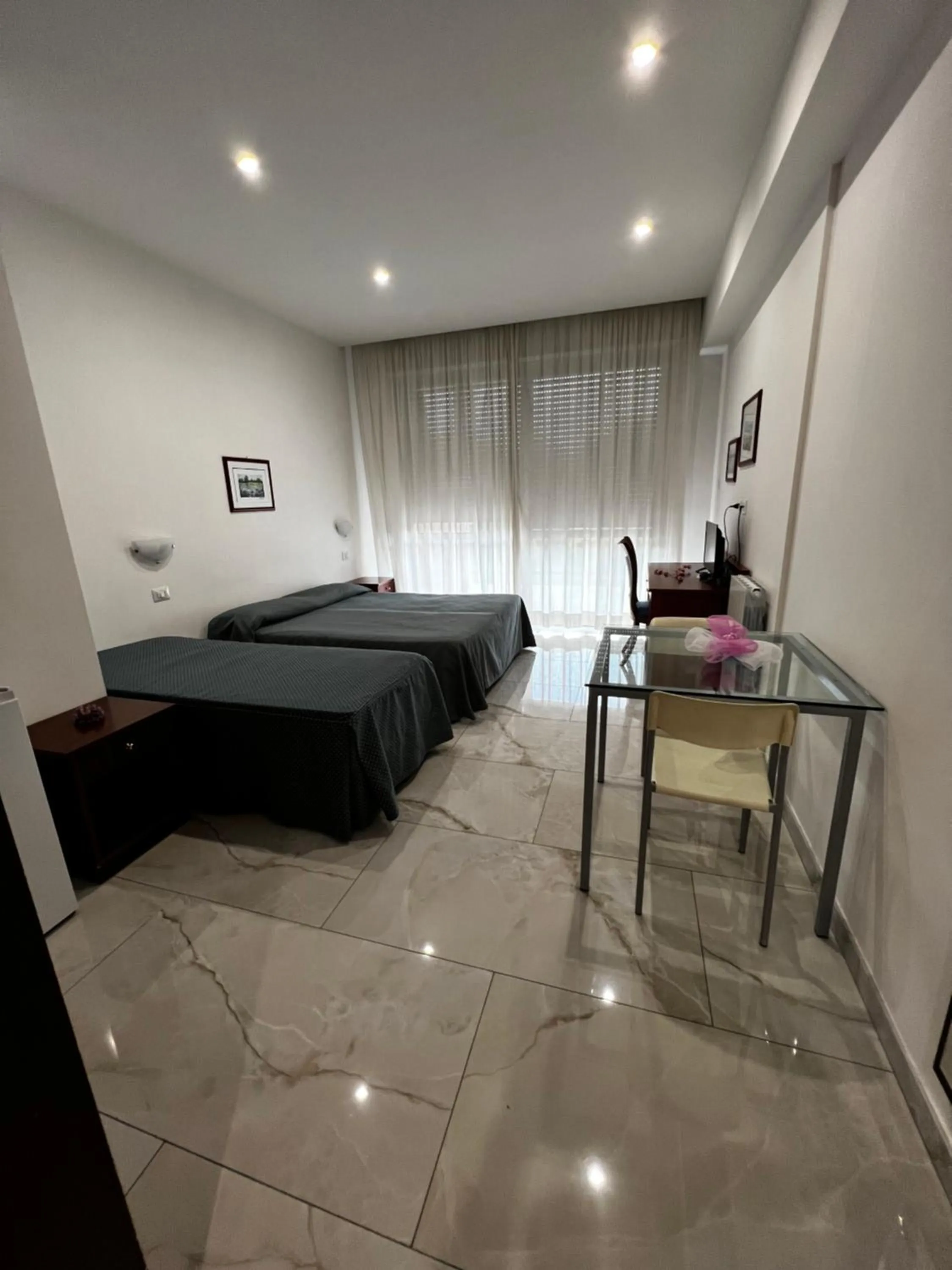 Bed in Parco Tirreno Hotel