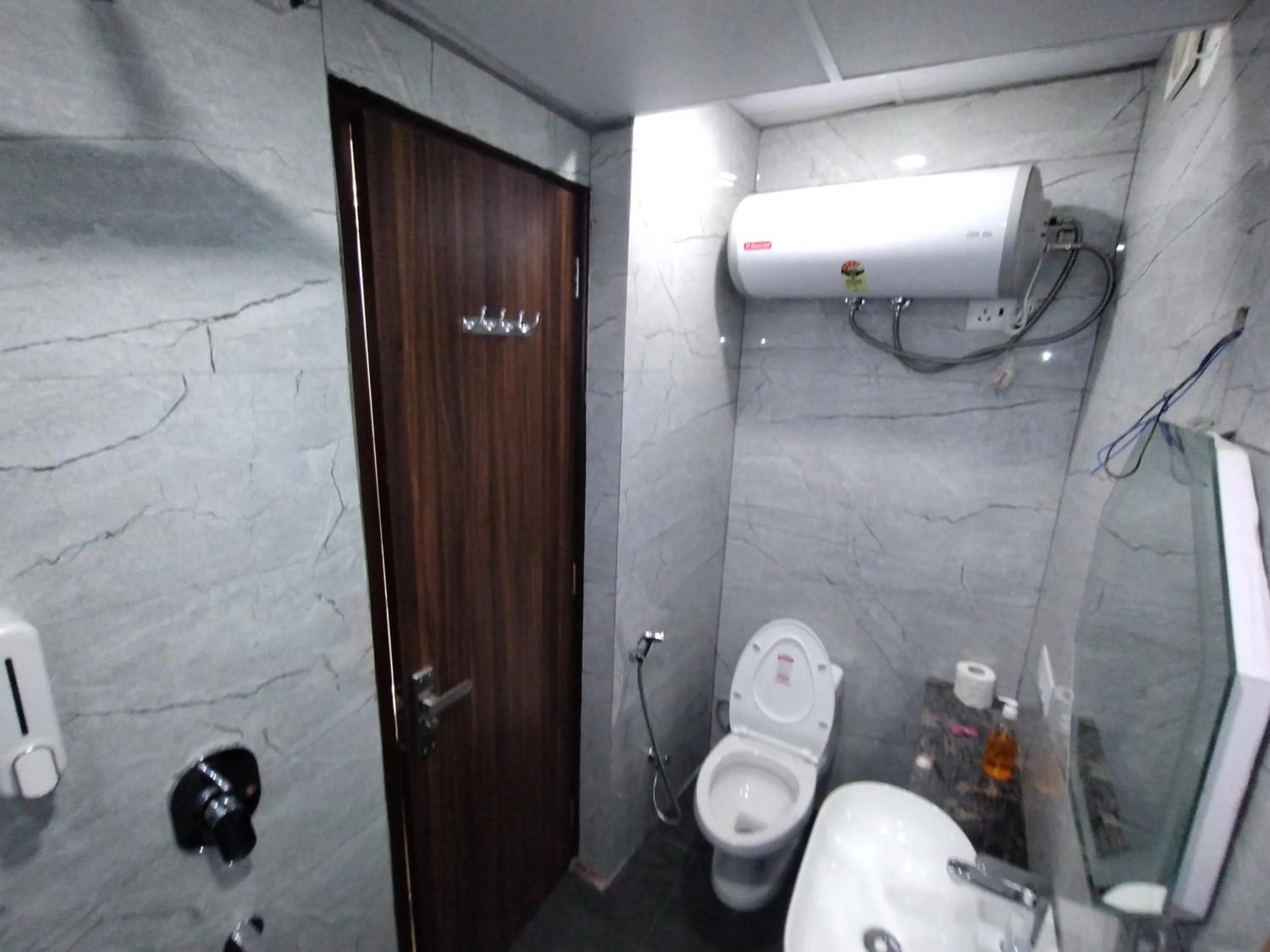 Toilet in Hotel Sunrise Ecostay
